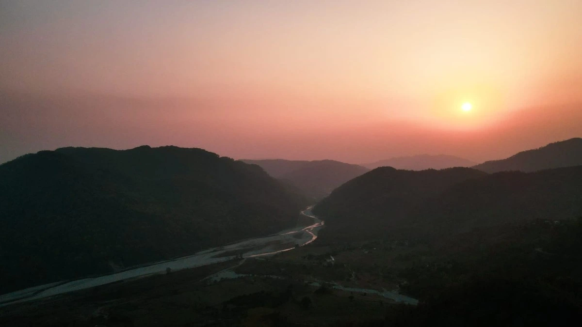 Sunset Over Mountain Forest Trails